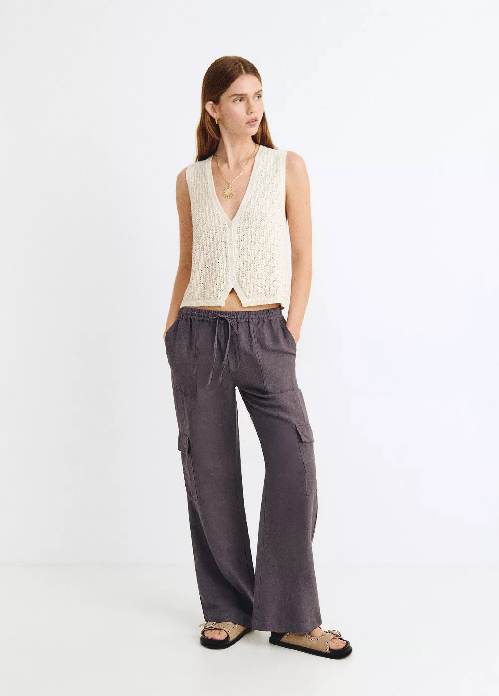 Linen trousers with cargo...