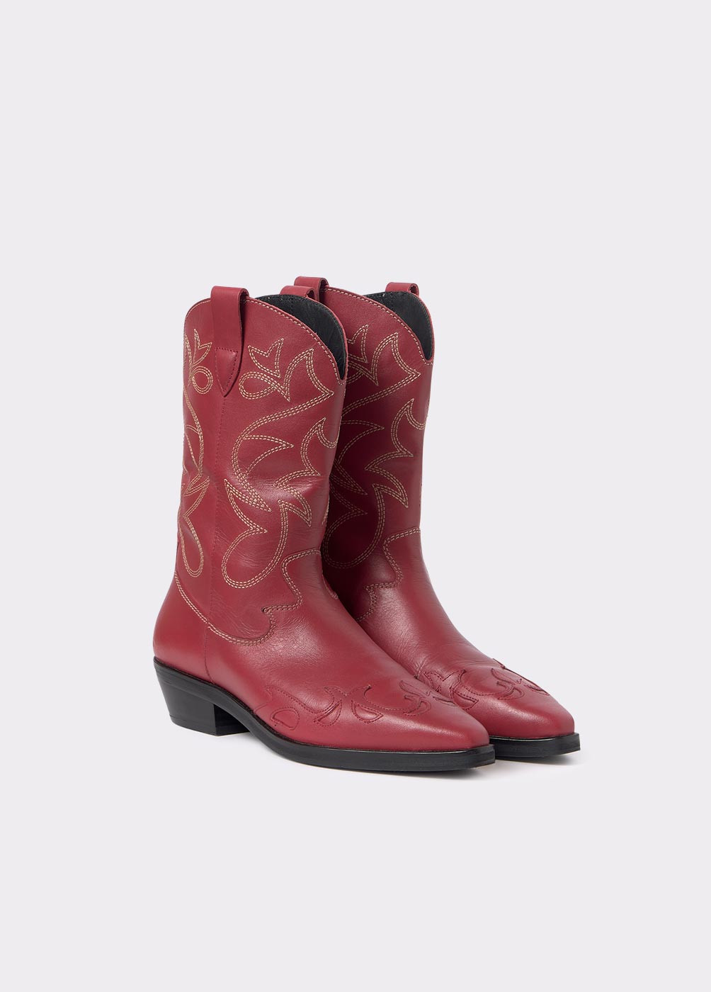 Bota cowboy pespuntes contraste piel